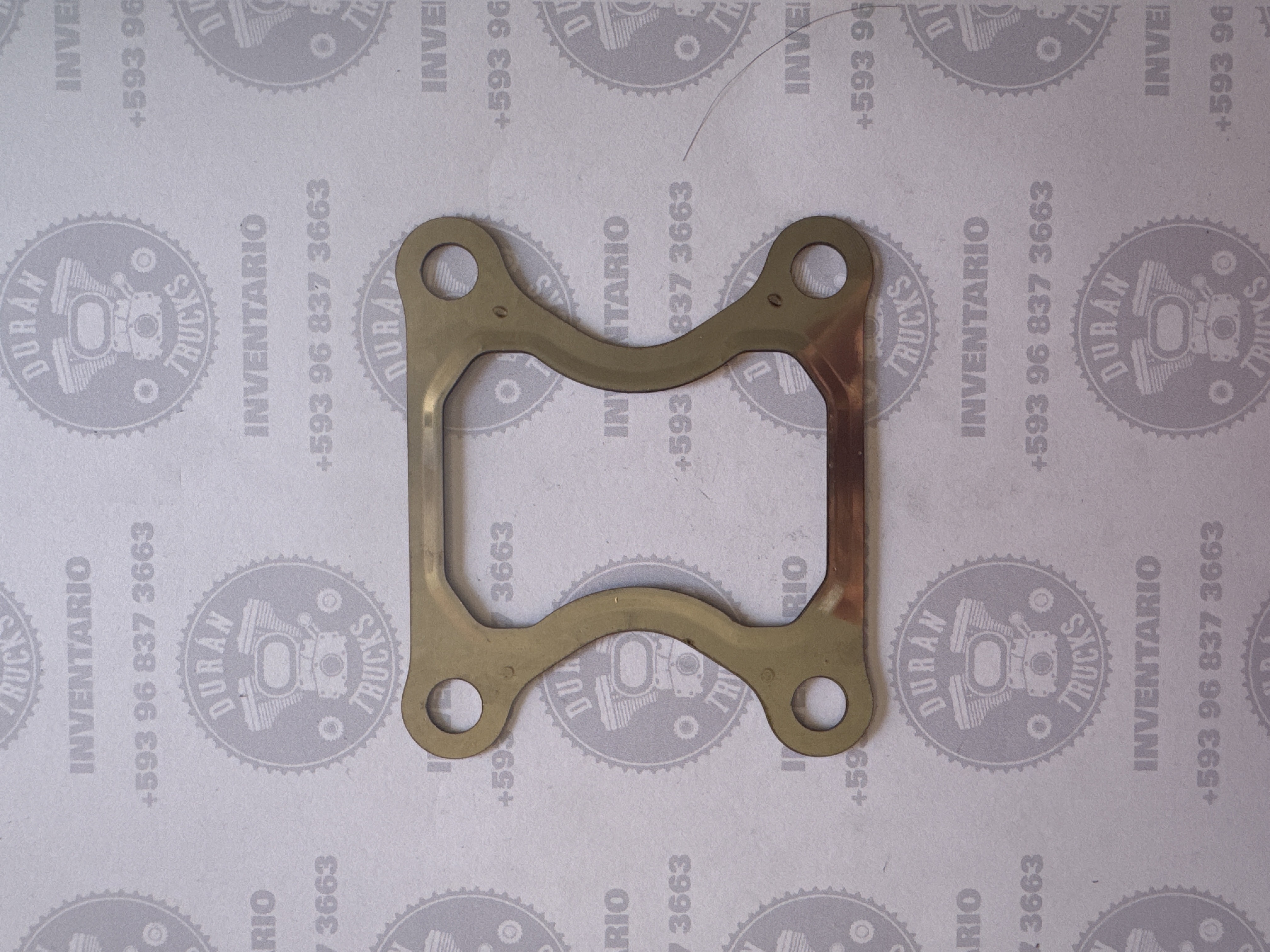 EMPAQUE DE BASE DEL TURBO CUMMINS ISX SOBRE MEDIDA